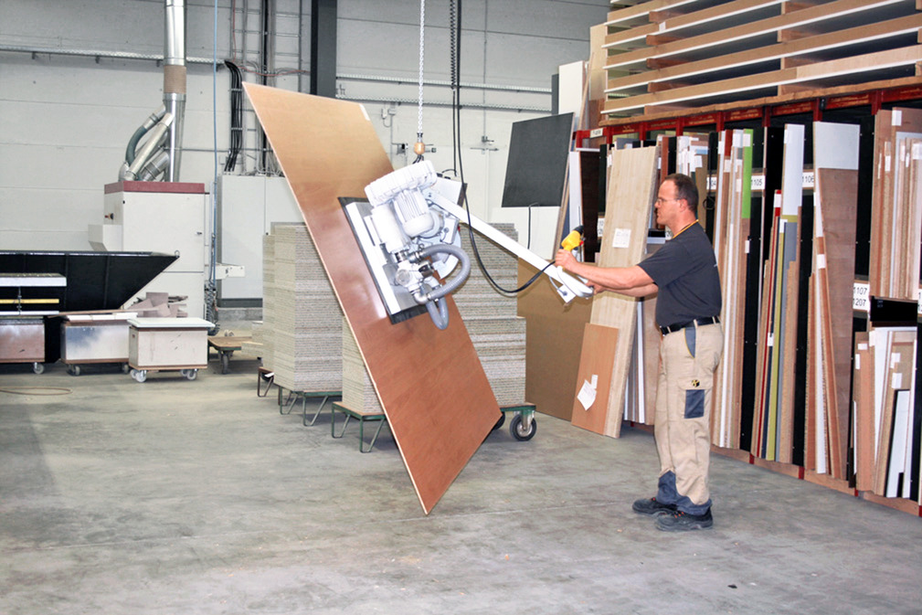Vacuum Lifting Device VacuMaster Multi facilitates Horizontal and Vertical Loading of a CNC Woodworking Center