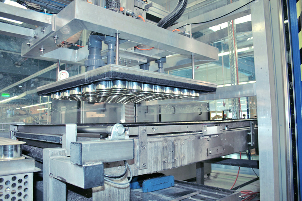 Layer gripping system SPZ for automated handling of cans in layers