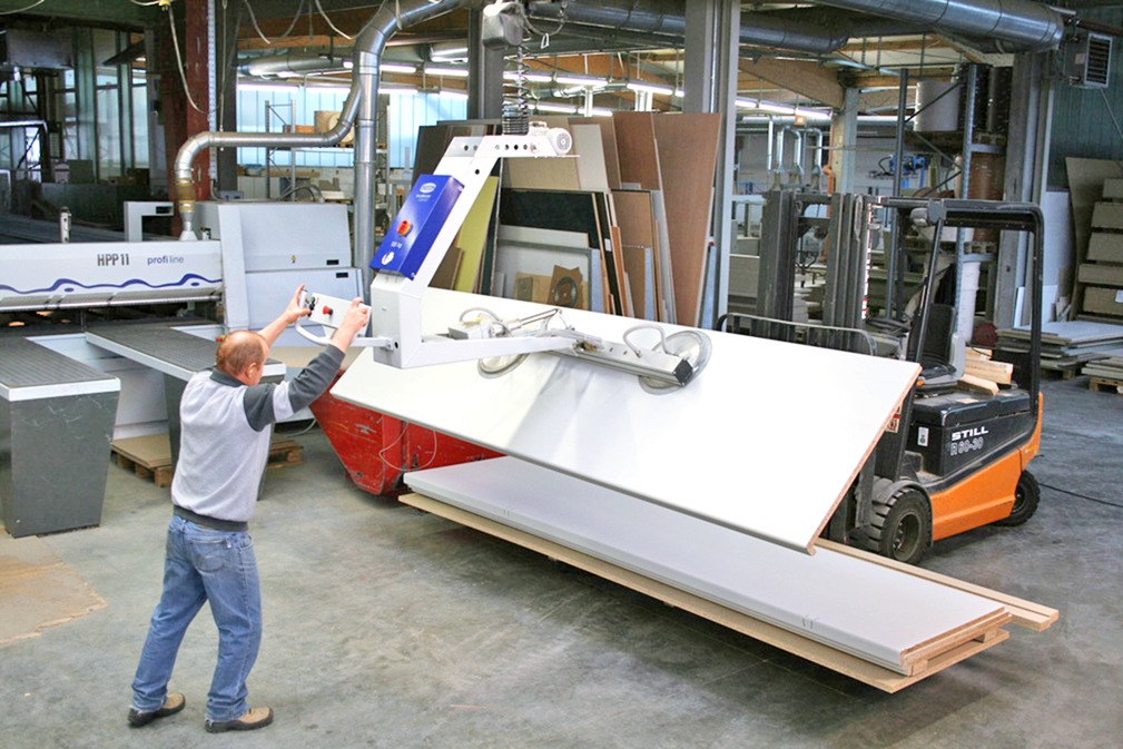 Vacuum Lifting Device VacuMaster Comfort Rotates Office Furniture Panels by 180 Degrees